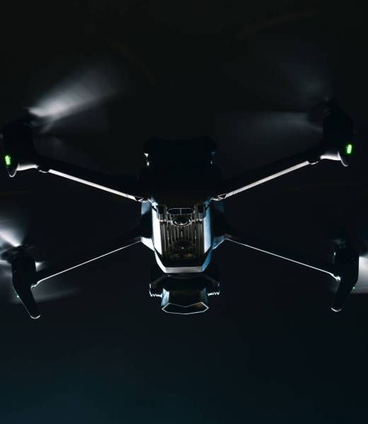 Modern Drone in Flight. Night Time Low Light Scenery. Aerial Technologies.